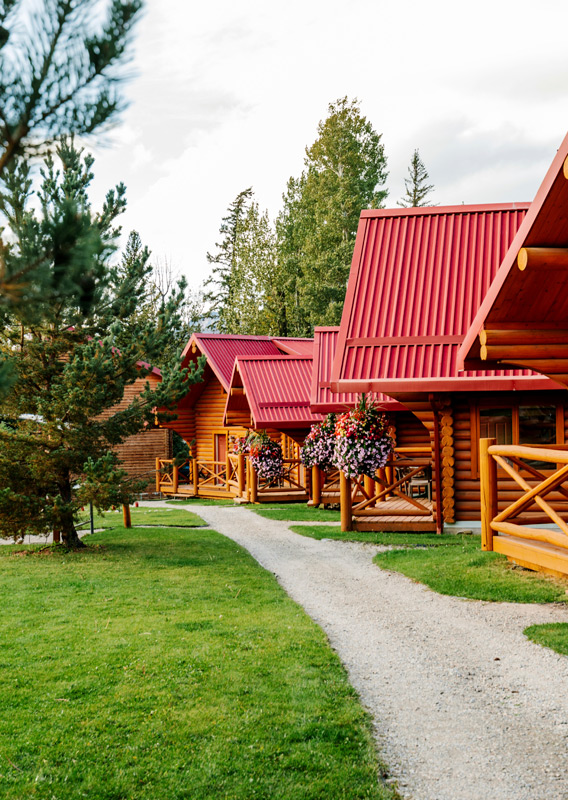An exterior view of Miette Mountain Cabins during the spring.