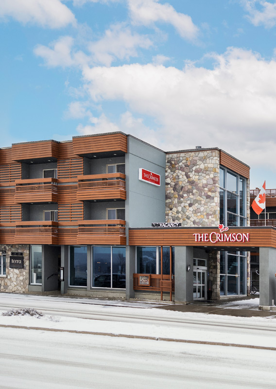 An exterior view of The Crimson hotel in the winter