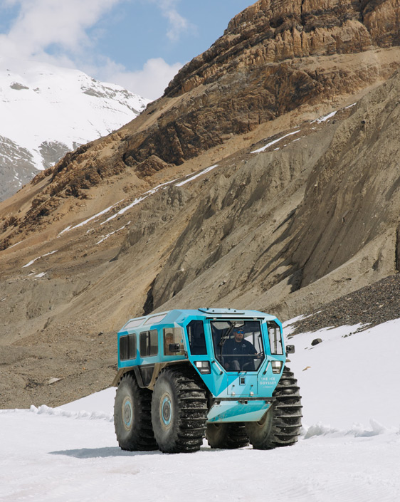 An Ice Odyssey vehicle driving on the Athabasca Glacier