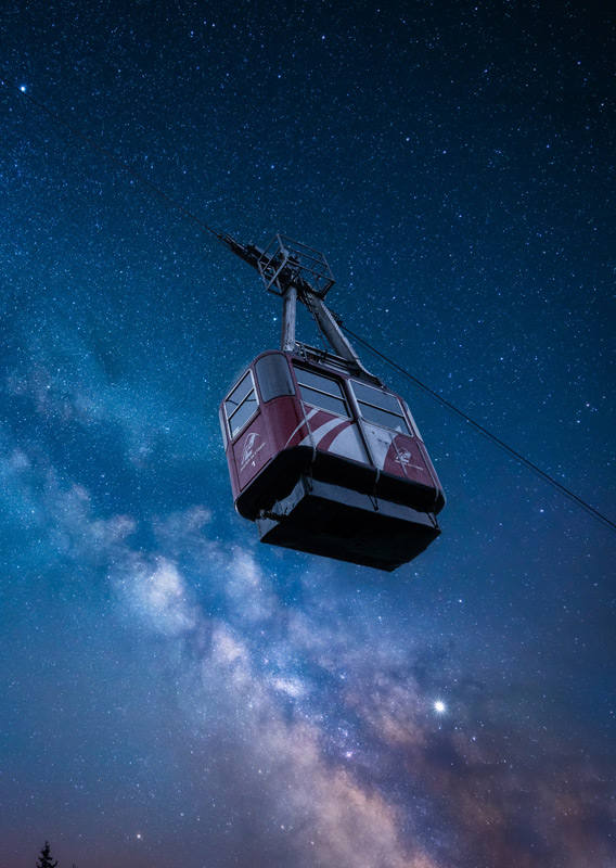 The Jasper SkyTram ascending the tramway under a starry sky